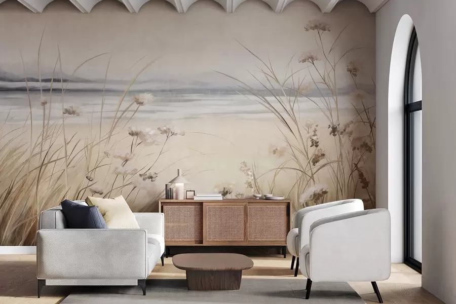 fotószőnyeg Búzamező fehér virágokkal az előtérben, a háttérben tengerpart és az óceán, semleges pasztellszínekkel, tompított színekkel w09298