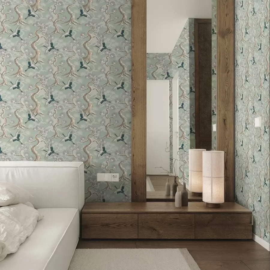 fotószőnyeg Darvak ívelt ágak között, lágy zsályaszínű háttér előtt a01023