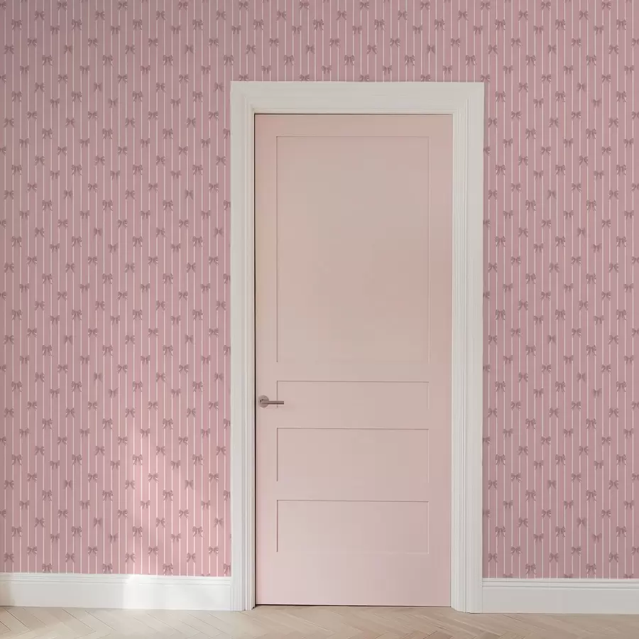 fotószőnyeg Kis rózsaszín masnik rózsaszín csíkos háttér előtt a01076v1